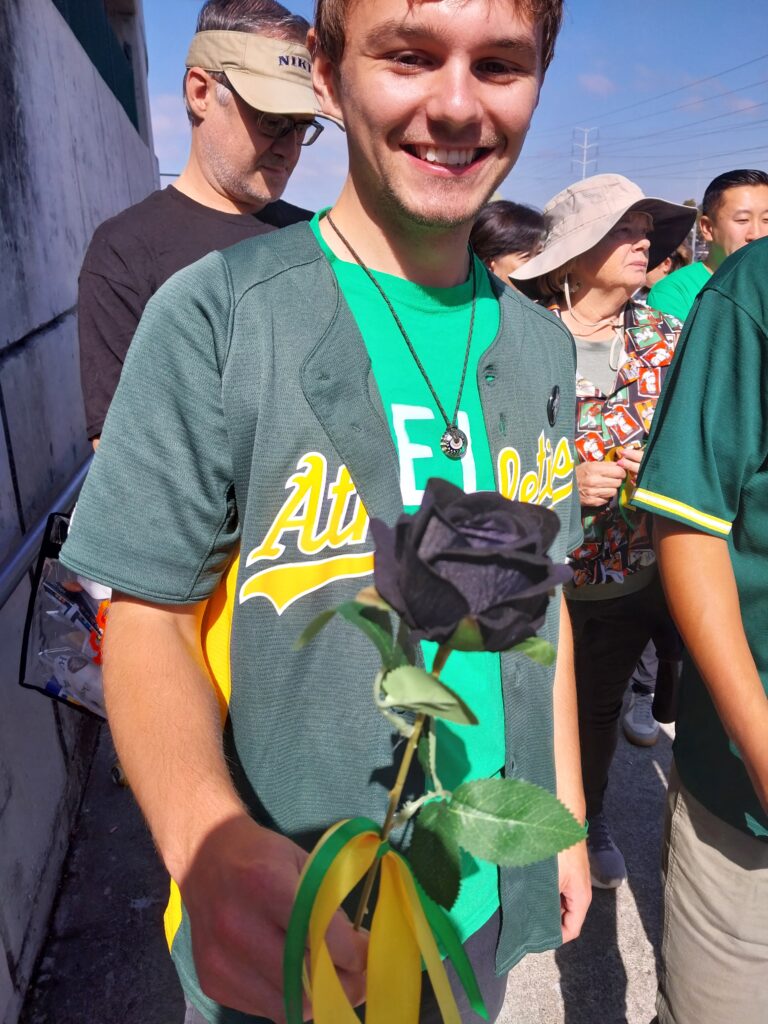 Oakland A's fan with black flower — last gamer at Coliseum — 20240926_112015